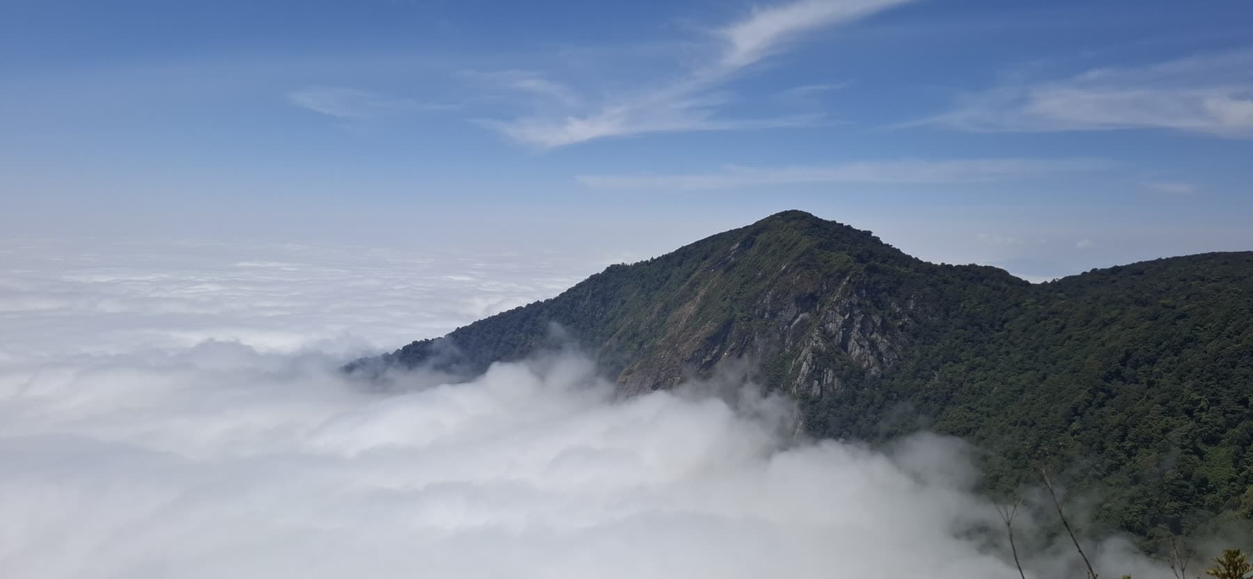 A sea of clouds below the Ndoto Mountains ridge at Moss Temple