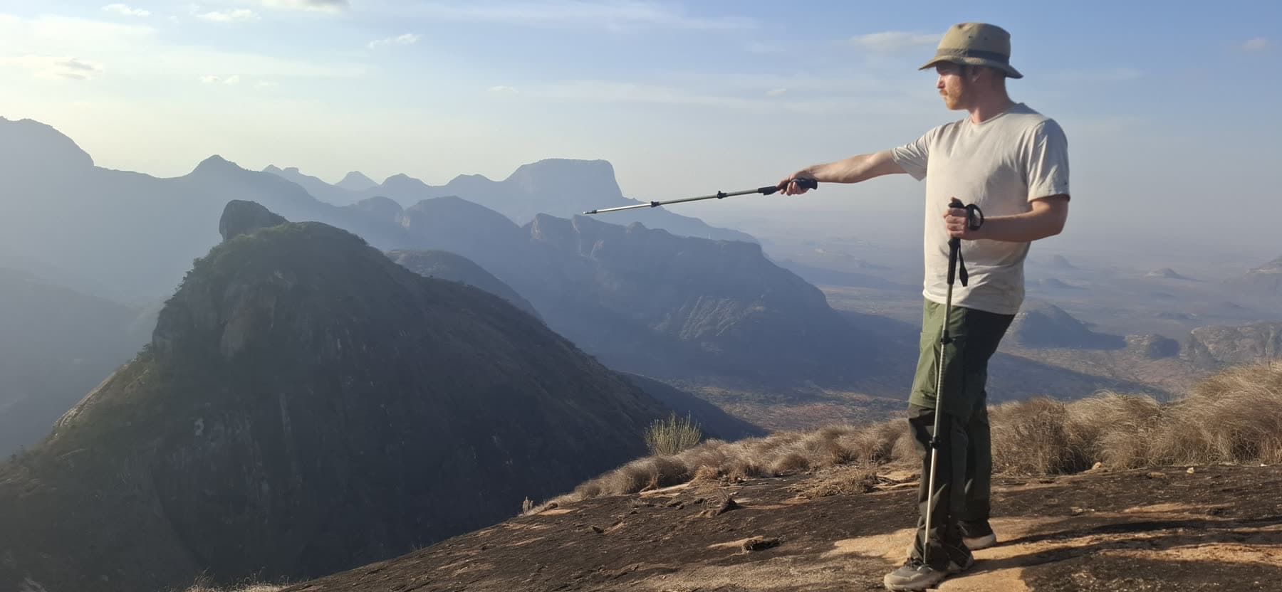 Pointing out the next ridge on a long day's walk in the Ndoto Mountains