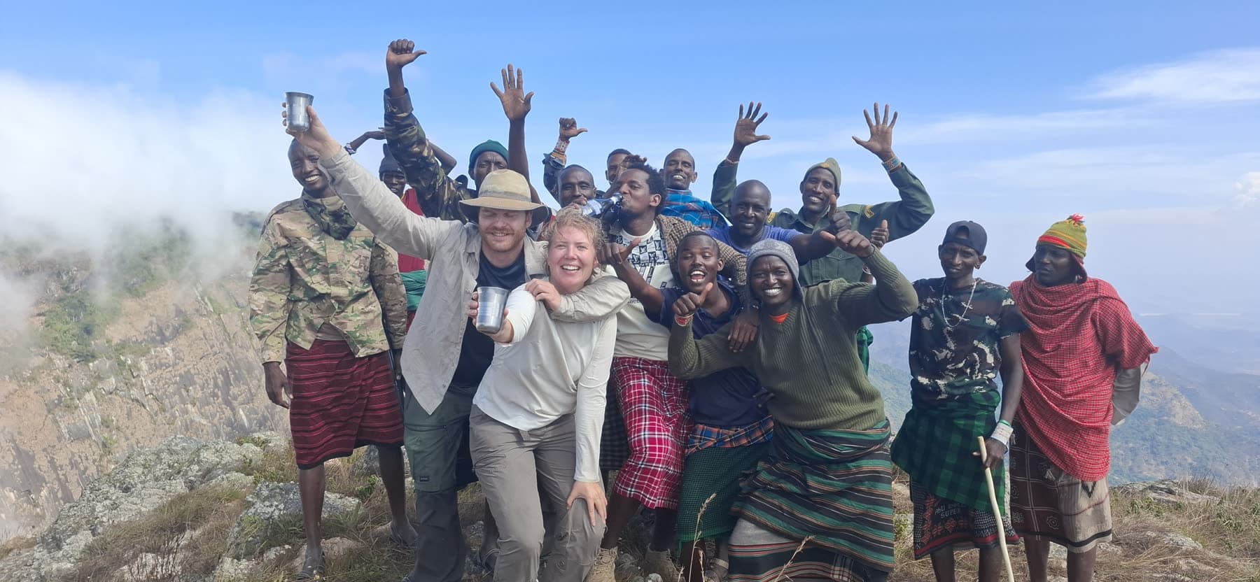 The whole trekking crew celebrating together on a Ndoto Mountains ridge